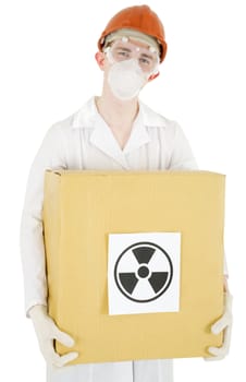 Man in garb scientist keeps cardboard box with sticker of the sign to radiation