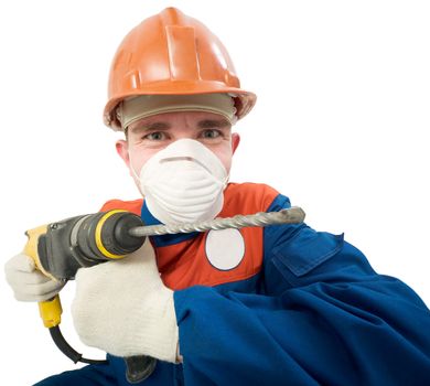 Builder in respirator and with perforator in hands