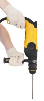 Yellow perforator in hands on a white background
