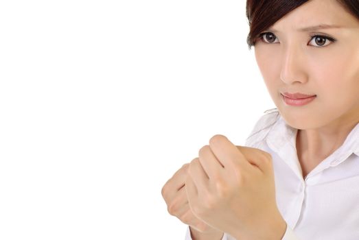 Fight business woman portrait with fist, closeup image with copyspace.