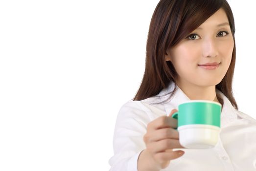 Business woman at leisure holding coffee and smiling, closeup portrait with white copyspace.
