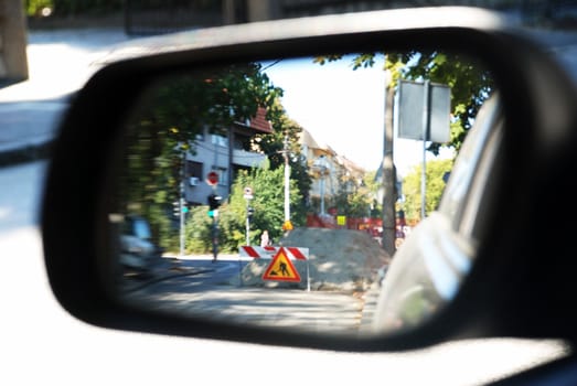 Works on street through car mirror