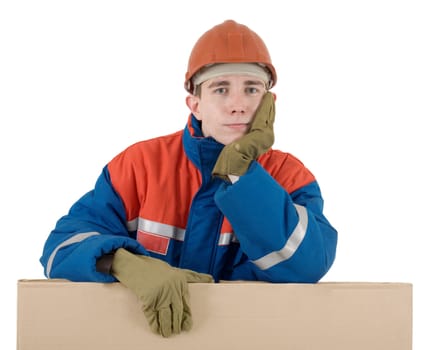 Labourer on the helmet with box on a white background