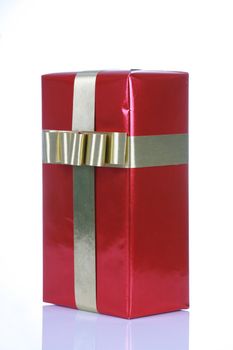 Red gift box with gold ribbons