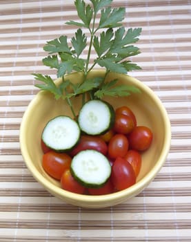 cherry tomatoes, parsley and cucumbers