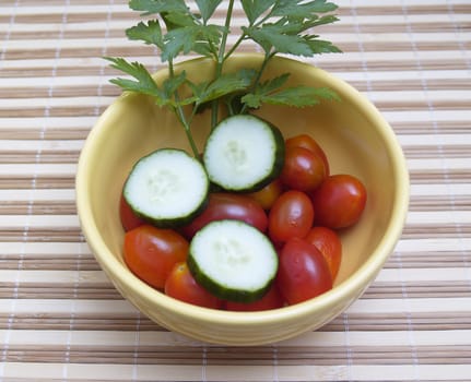 cherry tomatoes, parsley and cucumbers