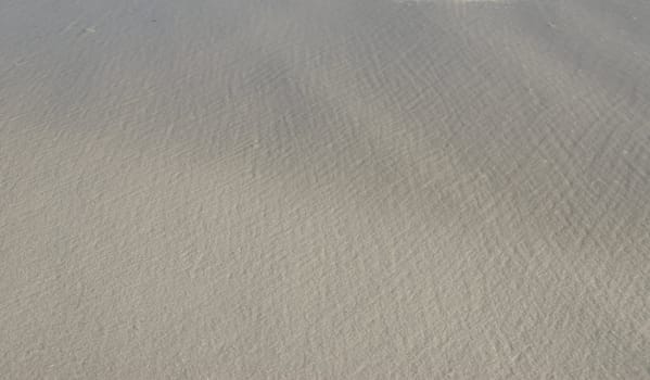 Background of smooth white beach sand