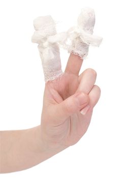 Hand with the bandaged, wounded fingers on a white background
