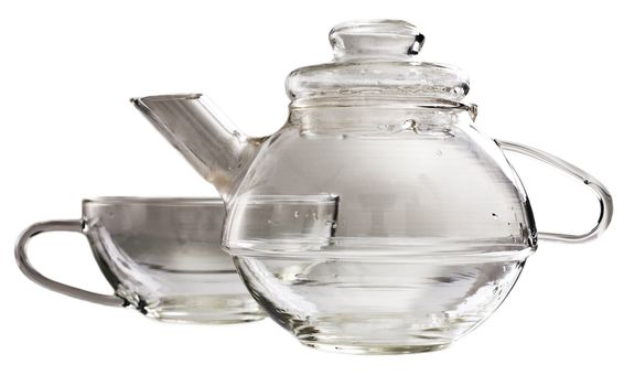 A transparent glass tea-set standing on a table