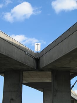 old concrete highway and blue sky