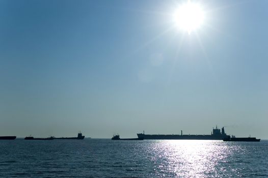 Ships passing Yangtze river, canal near Nantong city, Jiangsu province, vessels heading to East China Sea.