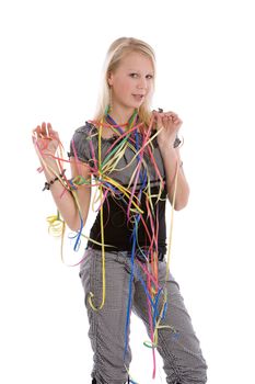 Cute blond girl with confetti around her on white background