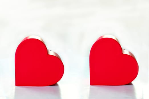 Two red heart box isolated over white background