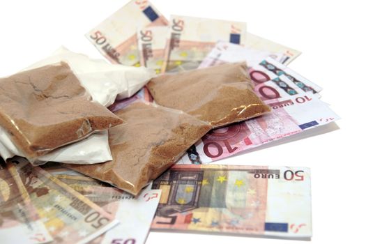 a stash of drugs and money showing a high cost to life