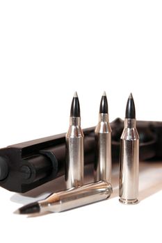silver ammo and a handgun depicting gun culture