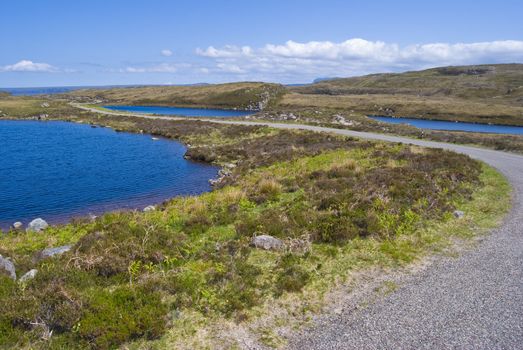 lonely country road in beautiful scottish surroundings