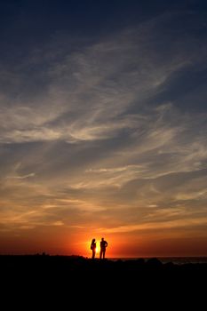 in love couple at sunset                               