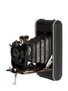 Old vintage camera isolated on white background