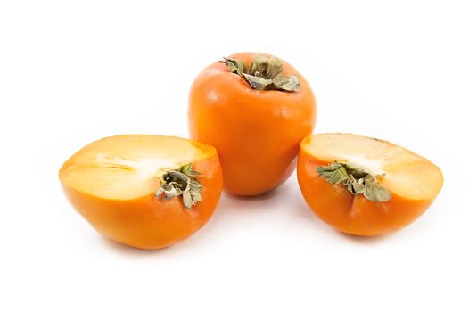 Ripen persimmon isolated on white