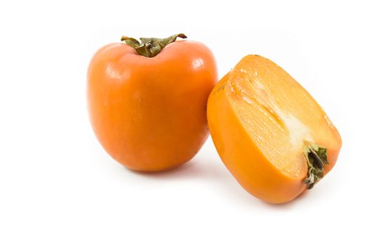 Ripen persimmon isolated on white