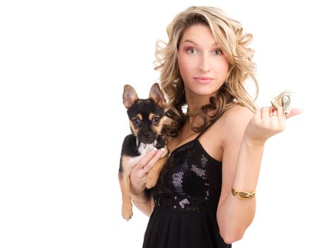 Attractive blond woman holding a dog and money