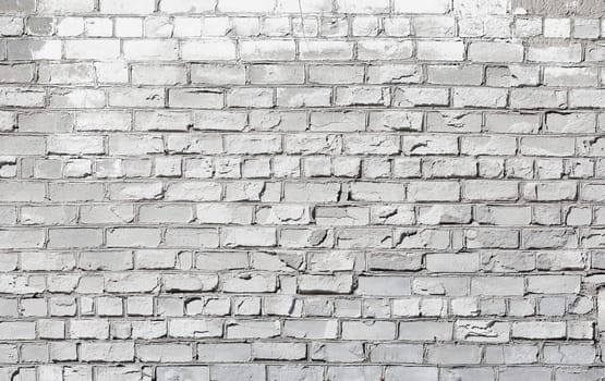 Pale gray old brick wall - architectural background