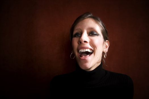 Pretty Woman Laughing in a Black Turtleneck