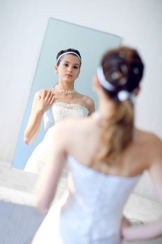 face of the bride in the mirror