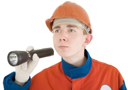 Man in worker cloth with flash-light in hand