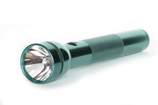 Green anodized aluminum flashlight on white background