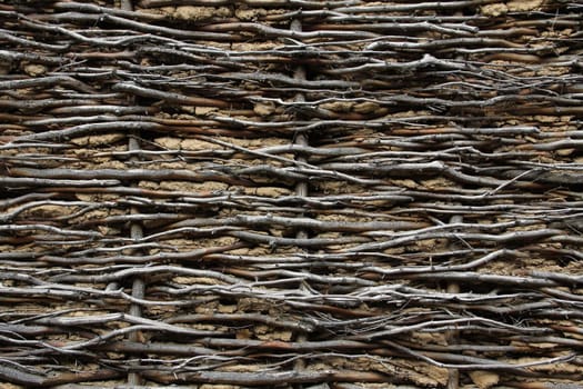 wattled barn near the background wall and clay.