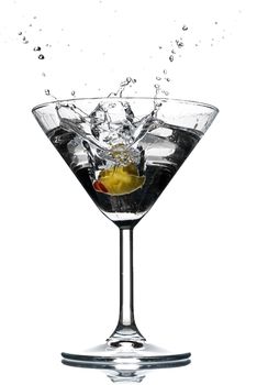 Cocktail splash with an olive over white