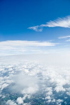 View from airplane above the clouds