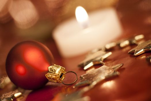 Christmas decoration with bauble. Shallow depth of field, focus on bauble, aRGB.