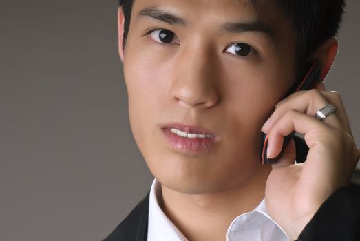 Business man with phone, closeup portrait with face.