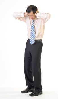 Business man under stress, full length portrait on white background.