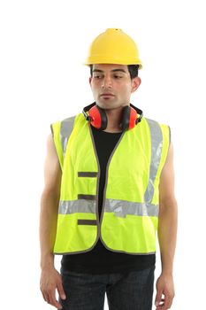 A builder, construction, worker, carpenter or other labourer wearing protective clothing.  He is looking down and sideways.  Suitable for a message, white background.