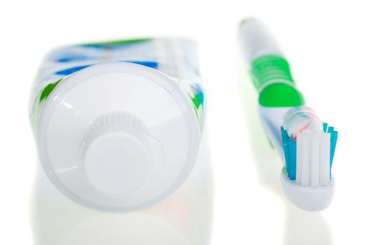 tooth-brush and tube of toothpaste, isolated on white