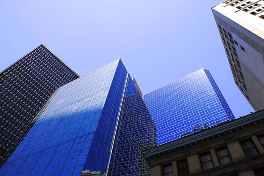 Modern office buildings in New York over blue sky