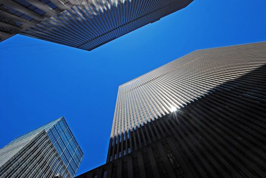 Modern office buildings in New York over blue sky