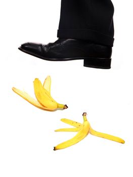 businessman shoe steping a banana