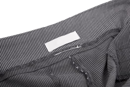 close-up of striped fabric and blank tag