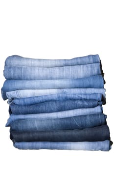 front view of stack, blue denim jeans