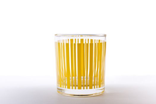 Yellow striped glass isolated background
