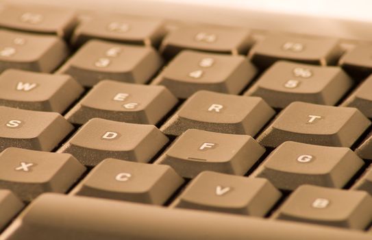 Close up of a dark keyboard, central keys