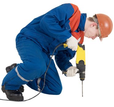 Builder holding yellow perforator on the hands