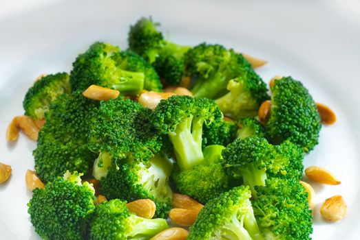 fresh and vivid sauteed broccoli and almonds very ealthy food