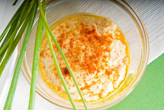 fresh healthy hummus with chives  typical middle east dish