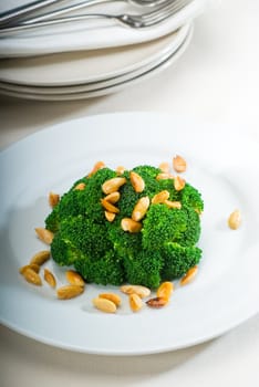 fresh and vivid sauteed broccoli and almonds very ealthy food