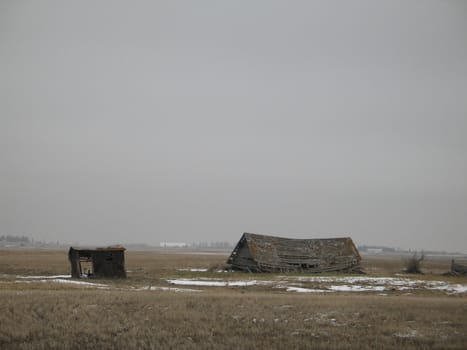 broken barn in a field